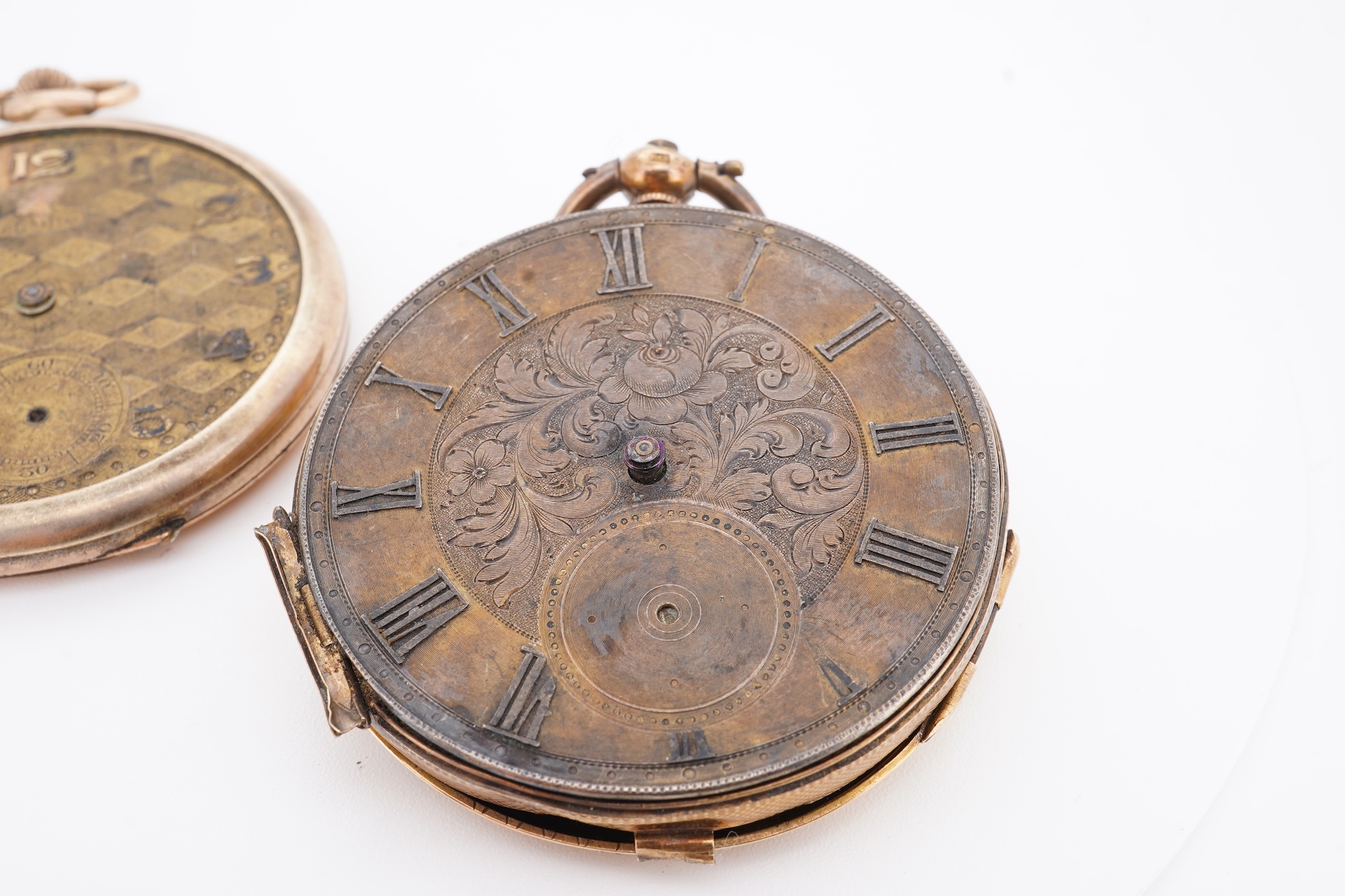 A damaged continental 18k lever pocket watch, together with a rolled gold pocket watch in similar condition.